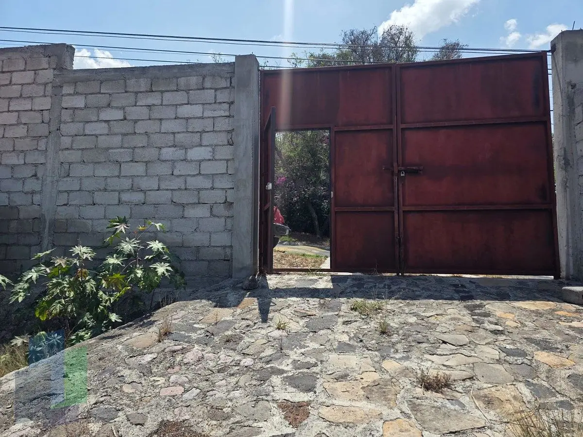 Terreno de 1000 en Villas del Mesón Juriquilla, con barda frontal y zagúan. — foto 2