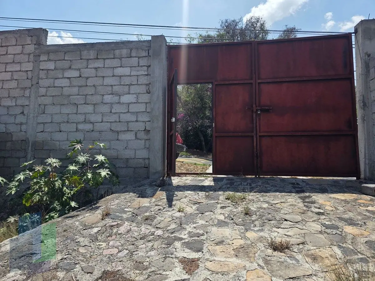 Terreno de 1000 en Villas del Mesón Juriquilla, con barda frontal y zagúan. — foto 2